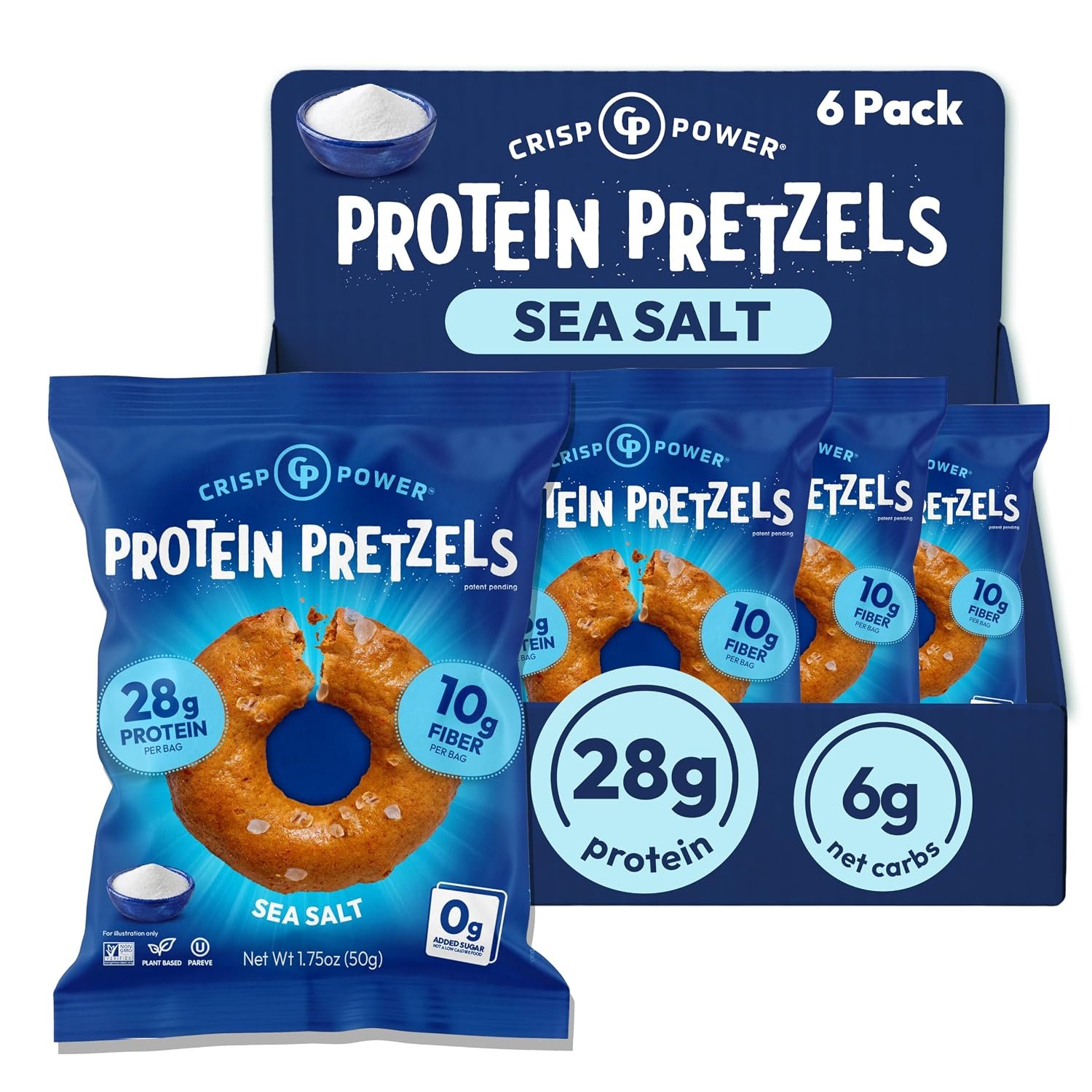 Box of Crisp Power Sea Salt Protein Pretzels on a kitchen counter with water glass and notebook nearby